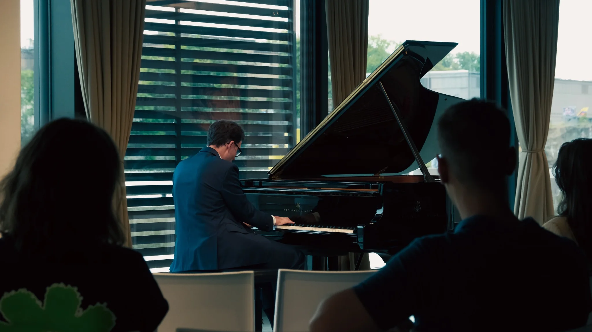 Pianist performing at an Althafen Foundation event