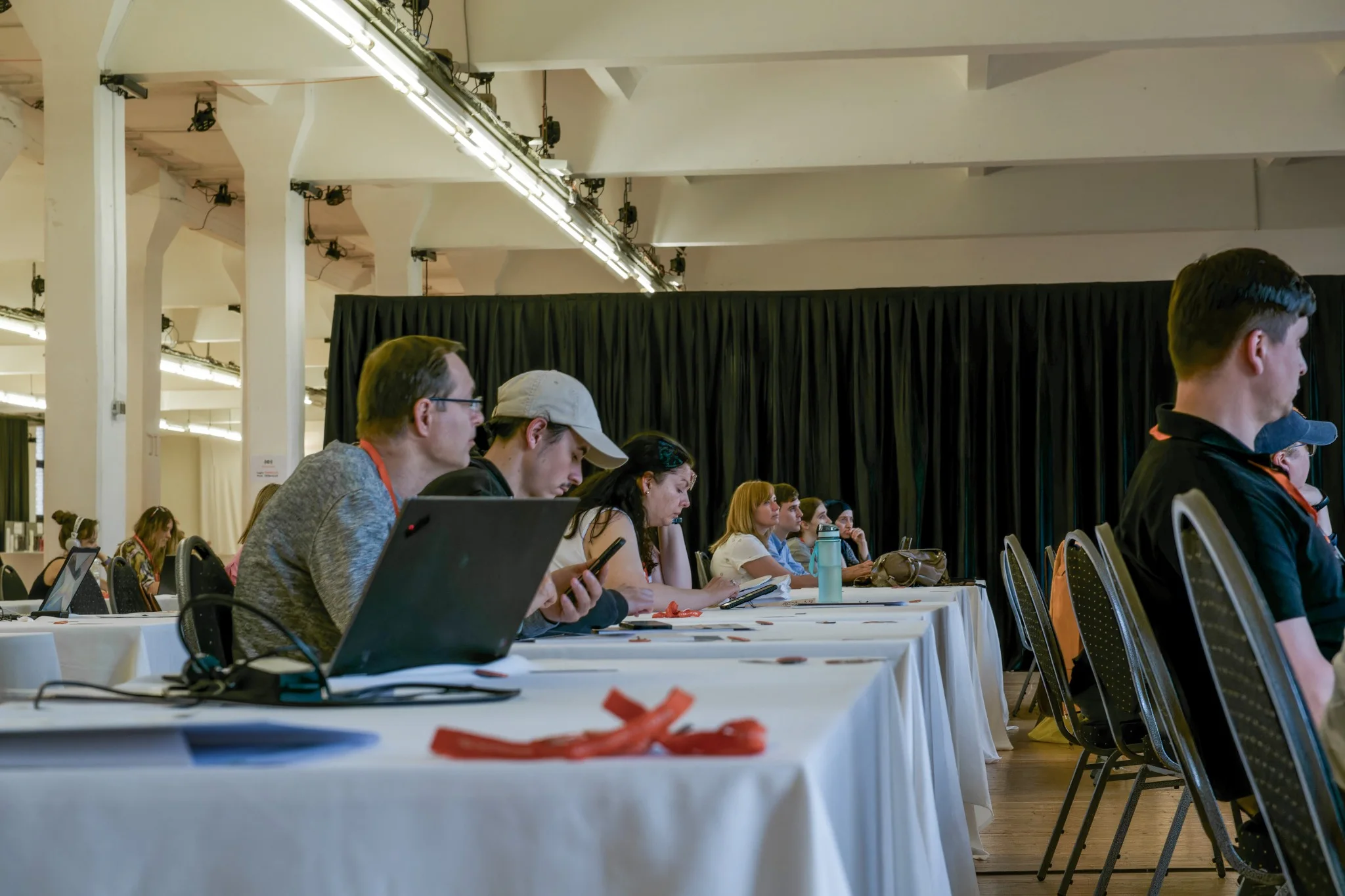 Participants seated at long tables during an ITCareerHub event