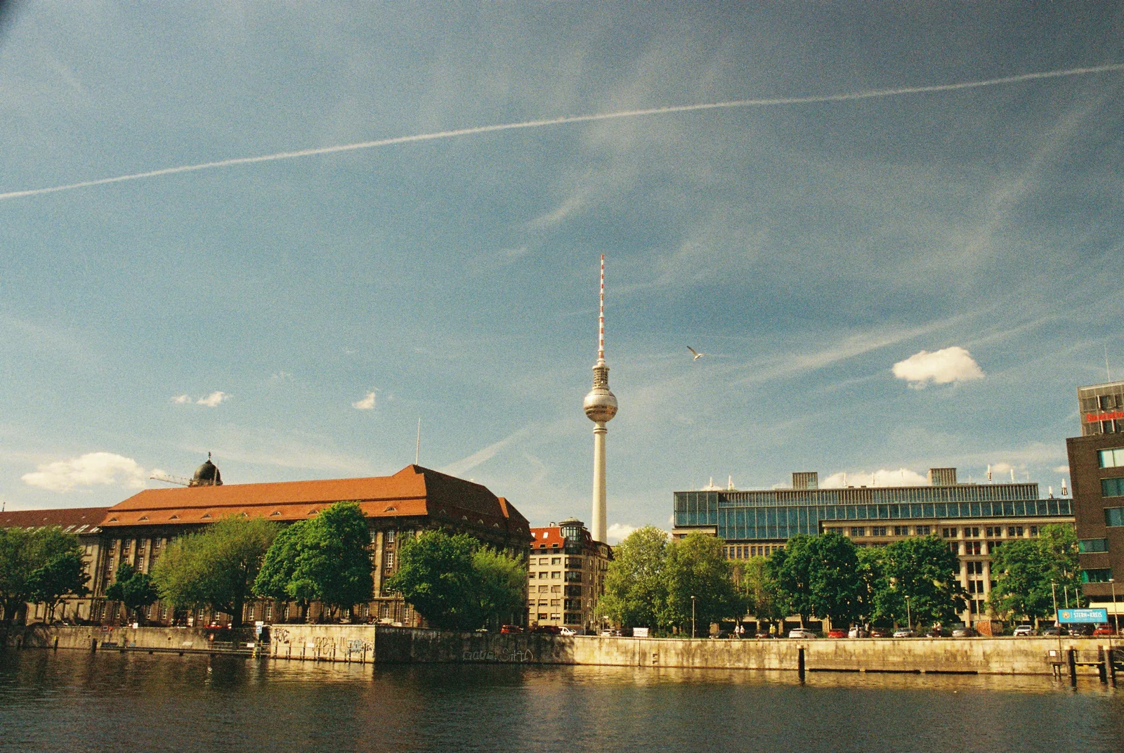 Berlin skyline and television tower seen across the River Spree